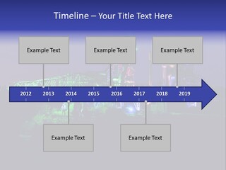 A Power Plant Lit Up At Night With Green And Blue Lights PowerPoint Template