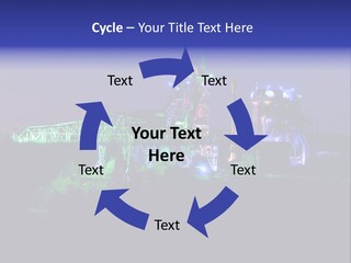 A Power Plant Lit Up At Night With Green And Blue Lights PowerPoint Template