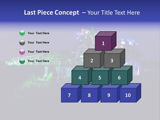 A Power Plant Lit Up At Night With Green And Blue Lights PowerPoint Template