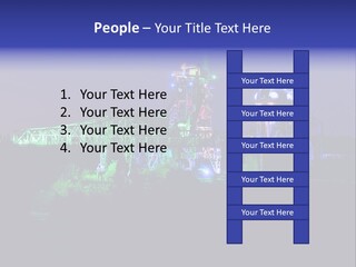 A Power Plant Lit Up At Night With Green And Blue Lights PowerPoint Template