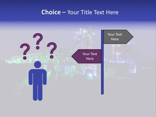 A Power Plant Lit Up At Night With Green And Blue Lights PowerPoint Template