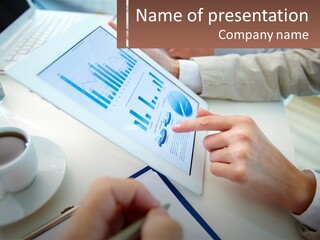 A Person Using A Tablet On A Table With A Cup Of Coffee PowerPoint Template