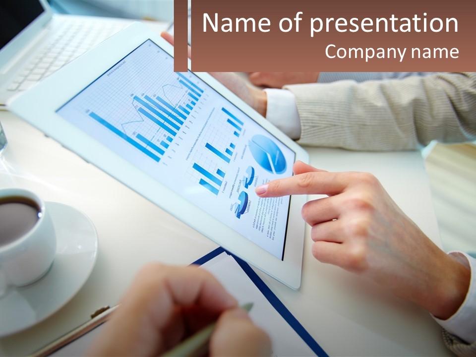 A Person Using A Tablet On A Table With A Cup Of Coffee PowerPoint Template