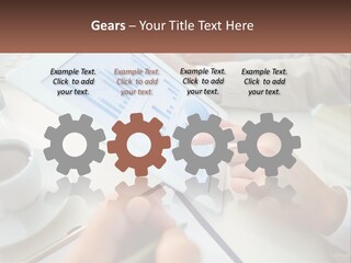 A Person Using A Tablet On A Table With A Cup Of Coffee PowerPoint Template