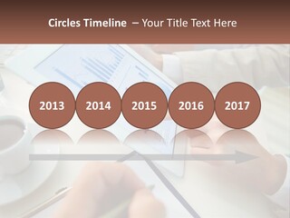 A Person Using A Tablet On A Table With A Cup Of Coffee PowerPoint Template