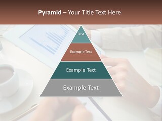 A Person Using A Tablet On A Table With A Cup Of Coffee PowerPoint Template