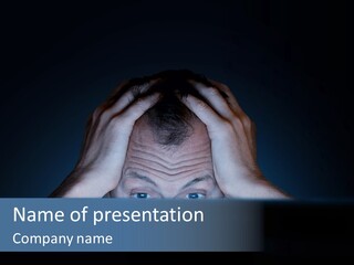 A Man Covering His Face With His Hands PowerPoint Template