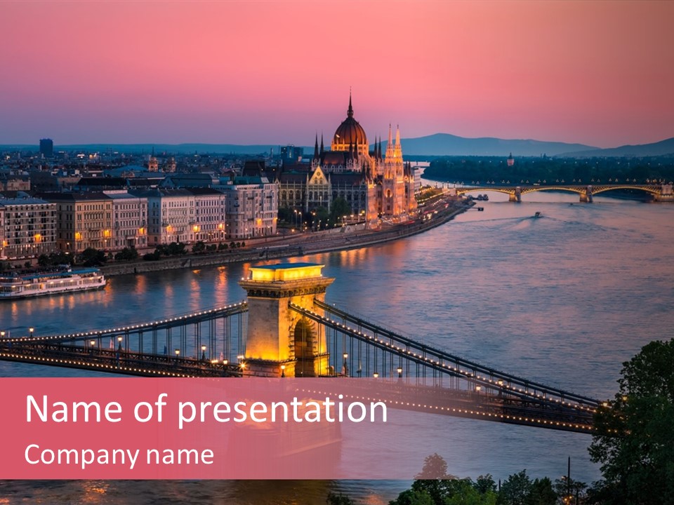 A Bridge Over A River With A City In The Background PowerPoint Template