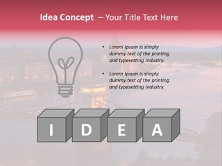 A Bridge Over A River With A City In The Background PowerPoint Template