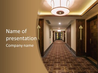 A Long Hallway With A Light On The Ceiling PowerPoint Template