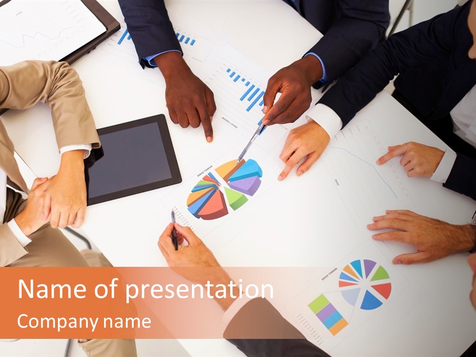 A Group Of Business People Sitting Around A Table PowerPoint Template