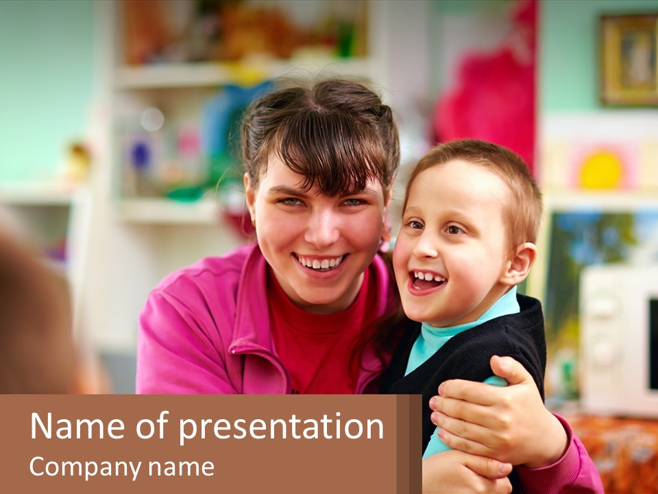 A Woman Holding A Small Child In Her Arms PowerPoint Template