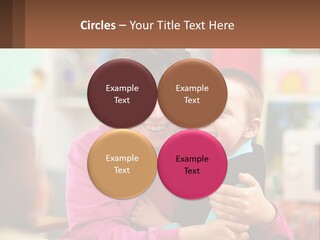 A Woman Holding A Small Child In Her Arms PowerPoint Template