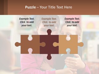 A Woman Holding A Small Child In Her Arms PowerPoint Template