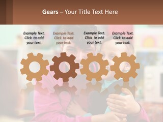 A Woman Holding A Small Child In Her Arms PowerPoint Template