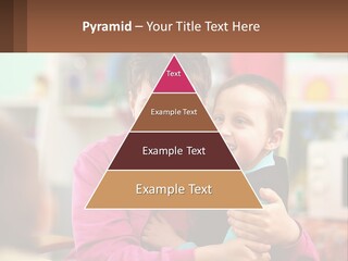 A Woman Holding A Small Child In Her Arms PowerPoint Template