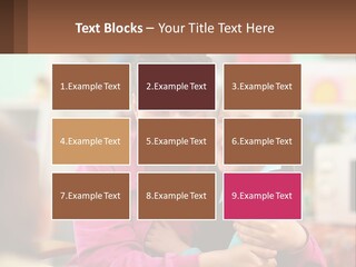 A Woman Holding A Small Child In Her Arms PowerPoint Template