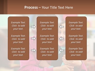 A Woman Holding A Small Child In Her Arms PowerPoint Template