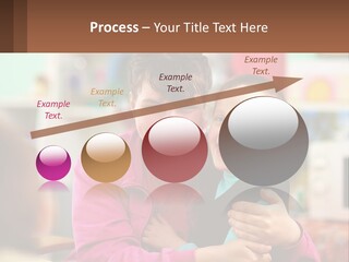 A Woman Holding A Small Child In Her Arms PowerPoint Template