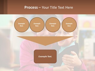 A Woman Holding A Small Child In Her Arms PowerPoint Template