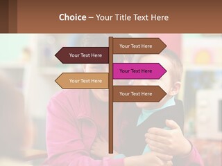 A Woman Holding A Small Child In Her Arms PowerPoint Template