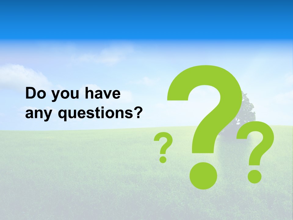 A Green Field With A Tree In The Middle Of It PowerPoint Template