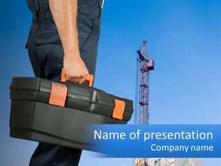 A Construction Worker Holding A Tool Box In Front Of A Crane PowerPoint Template