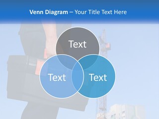 A Construction Worker Holding A Tool Box In Front Of A Crane PowerPoint Template