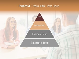 A Group Of People Sitting Around A Table PowerPoint Template