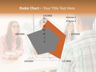 A Group Of People Sitting Around A Table PowerPoint Template