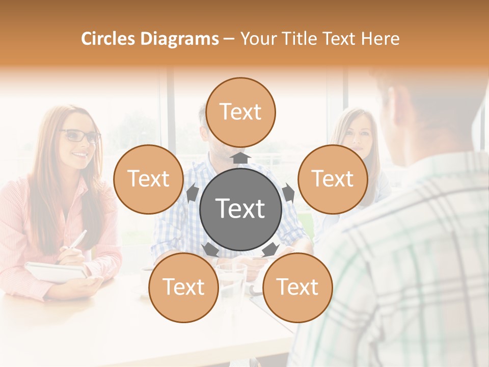 A Group Of People Sitting Around A Table PowerPoint Template