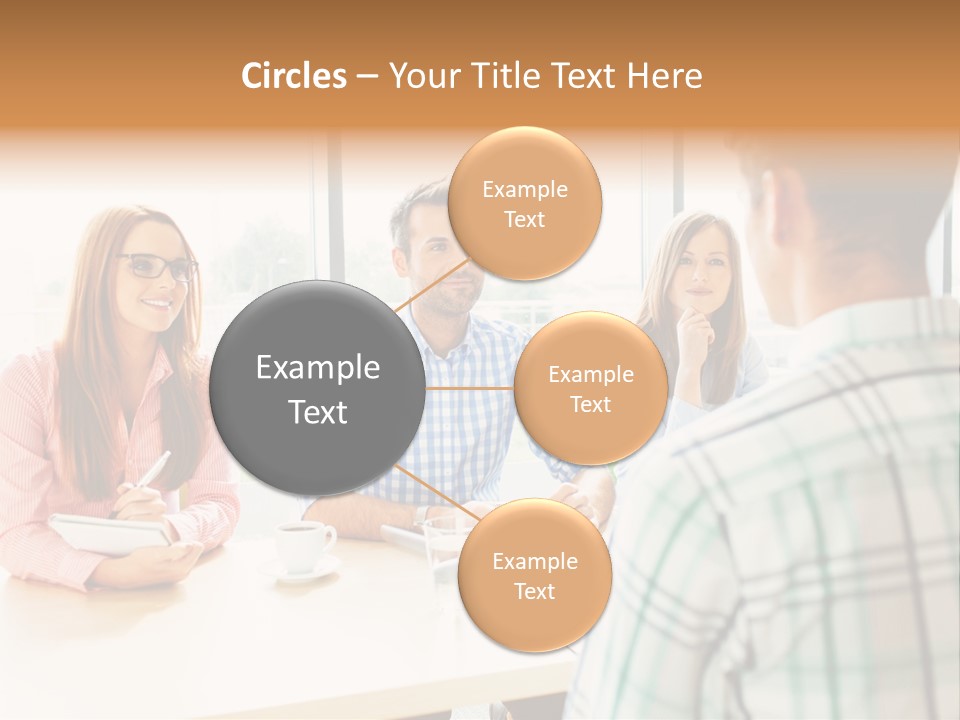 A Group Of People Sitting Around A Table PowerPoint Template