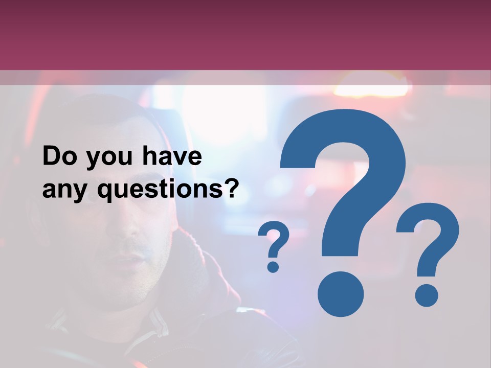 A Man Driving A Car With A Red Light In The Background PowerPoint Template