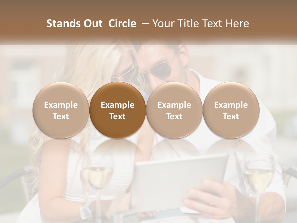 A Man And Woman Sitting At A Table With A Tablet PowerPoint Template