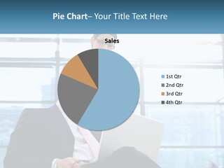 A Man And A Woman Are Looking At A Laptop PowerPoint Template