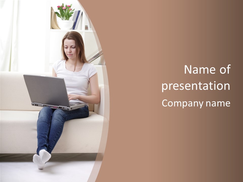 A Woman Sitting On A Couch Using A Laptop Computer PowerPoint Template