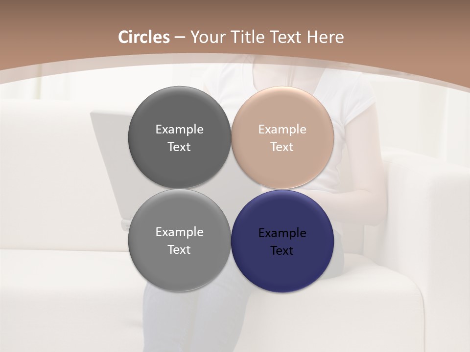 A Woman Sitting On A Couch Using A Laptop Computer PowerPoint Template