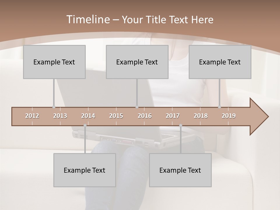 A Woman Sitting On A Couch Using A Laptop Computer PowerPoint Template