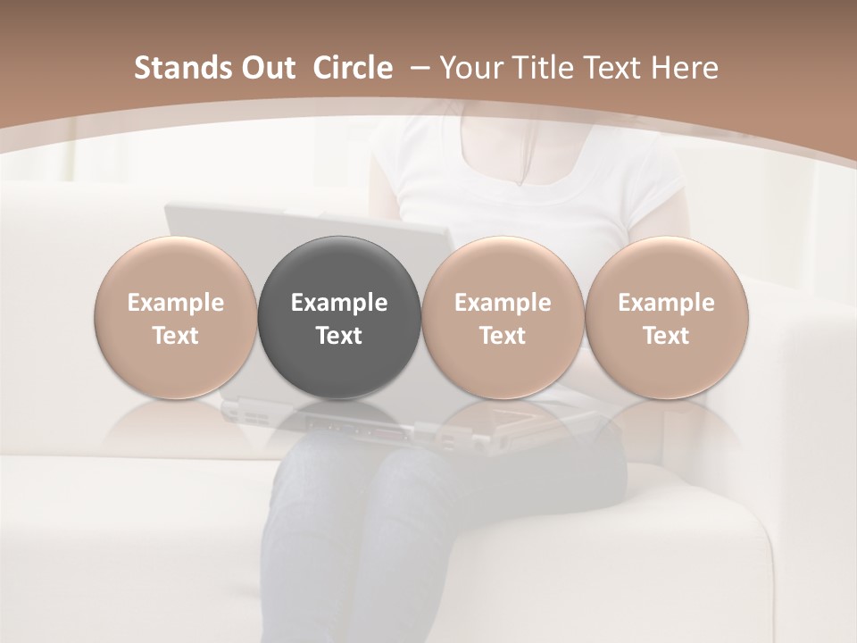 A Woman Sitting On A Couch Using A Laptop Computer PowerPoint Template