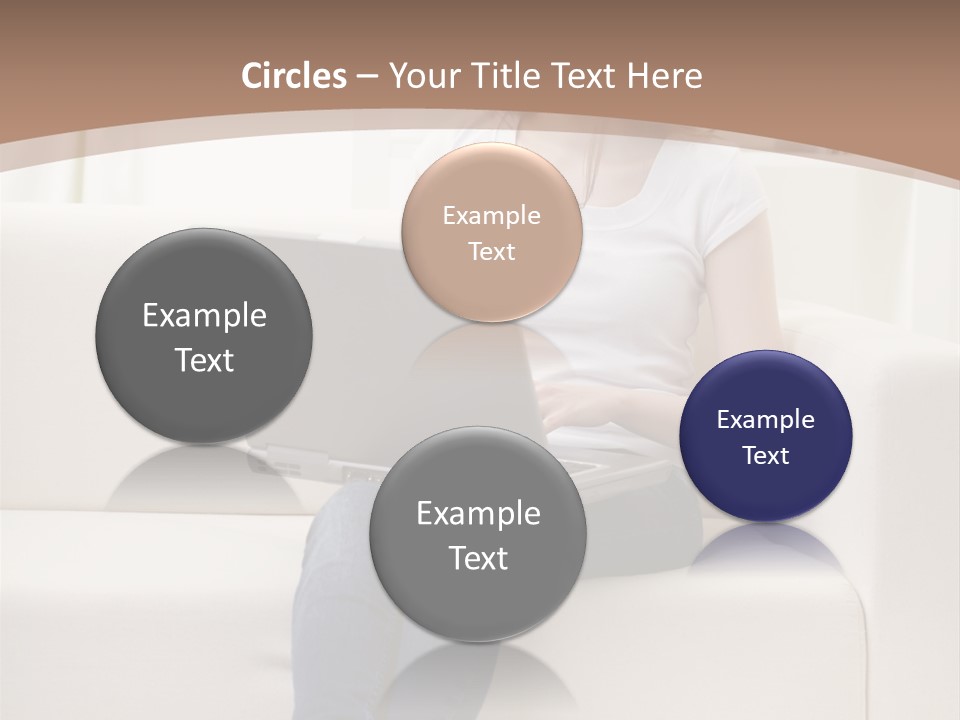 A Woman Sitting On A Couch Using A Laptop Computer PowerPoint Template