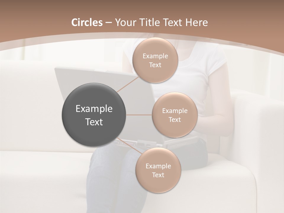 A Woman Sitting On A Couch Using A Laptop Computer PowerPoint Template