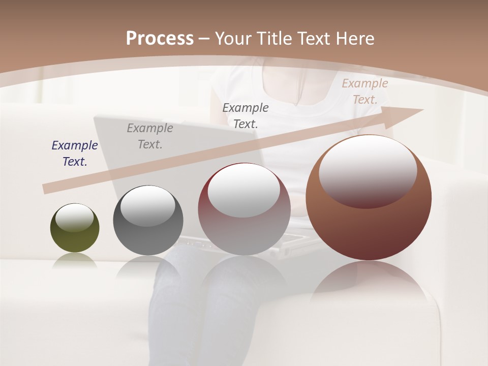 A Woman Sitting On A Couch Using A Laptop Computer PowerPoint Template