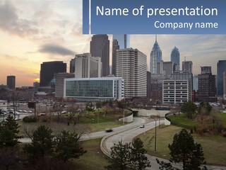 A Picture Of A City With A Sky Line In The Background PowerPoint Template