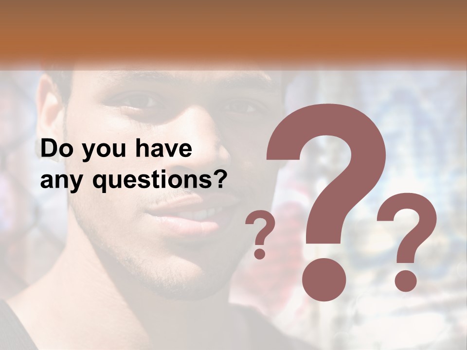 A Man In A Red Hat Is Looking At The Camera PowerPoint Template