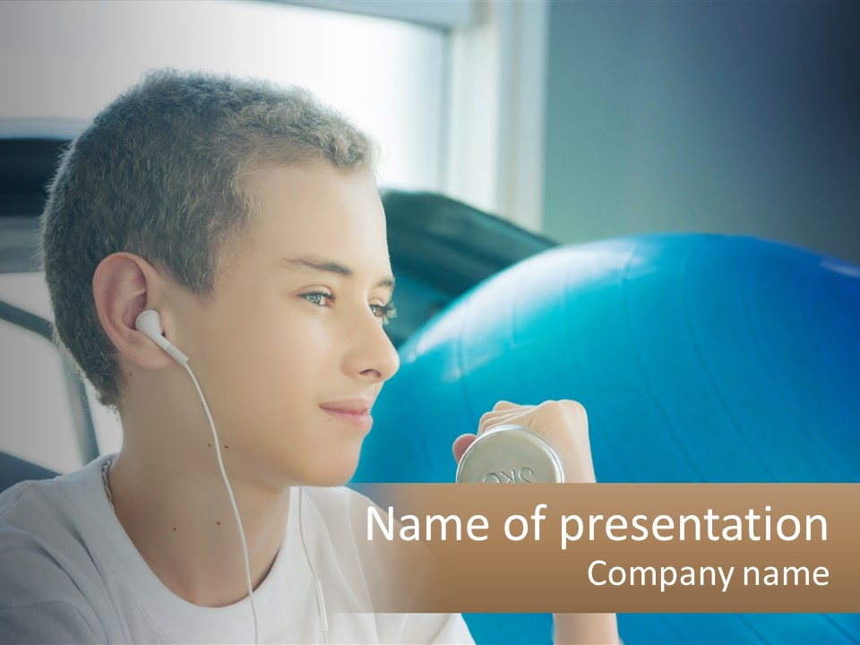 A Young Man Listening To Music With Headphones PowerPoint Template