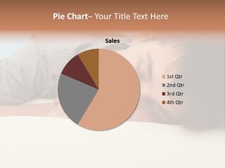 A Young Boy Sleeping On Top Of A Bed PowerPoint Template