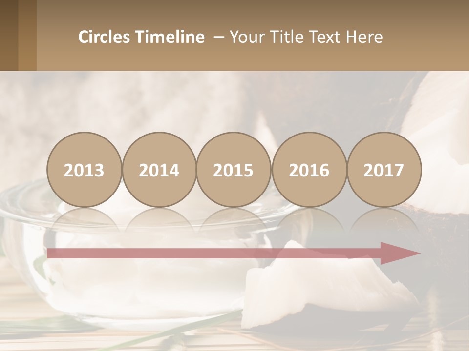 A Bowl Of Coconuts Next To A Cut In Half Coconut PowerPoint Template