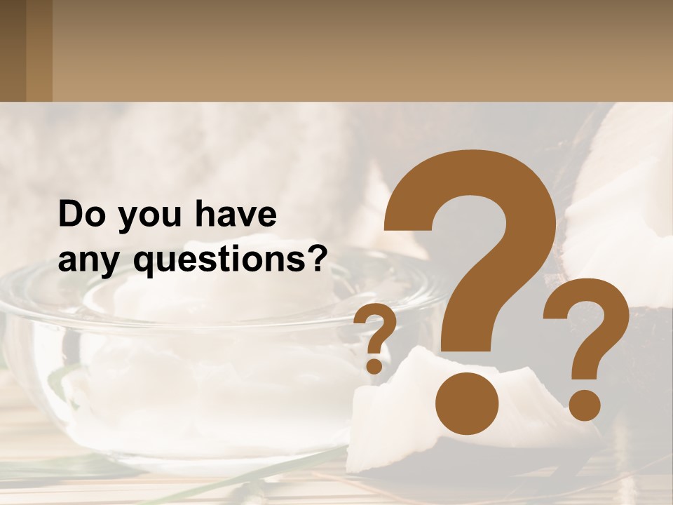 A Bowl Of Coconuts Next To A Cut In Half Coconut PowerPoint Template