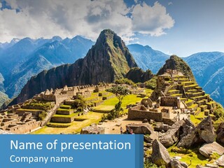 A View Of A Mountain Range With A Few Ruins In The Foreground PowerPoint Template