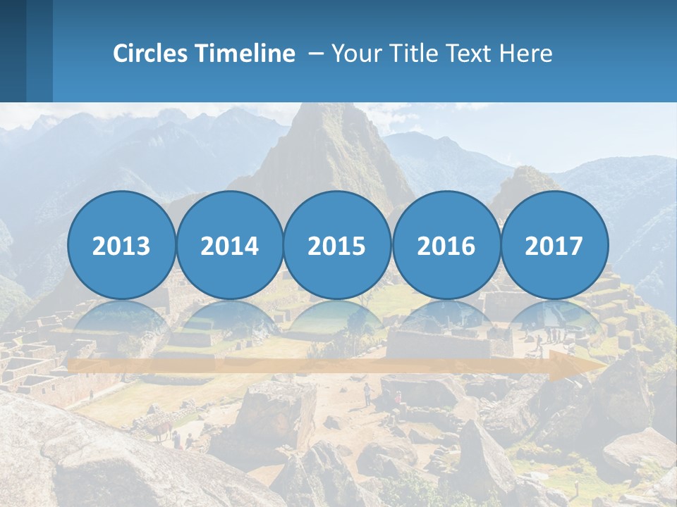 A View Of A Mountain Range With A Few Ruins In The Foreground PowerPoint Template